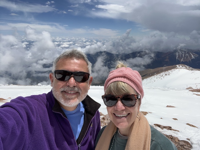 Mike and Susan from RVBlogger on top of Pikes Peak in June with over 6 feet of snow