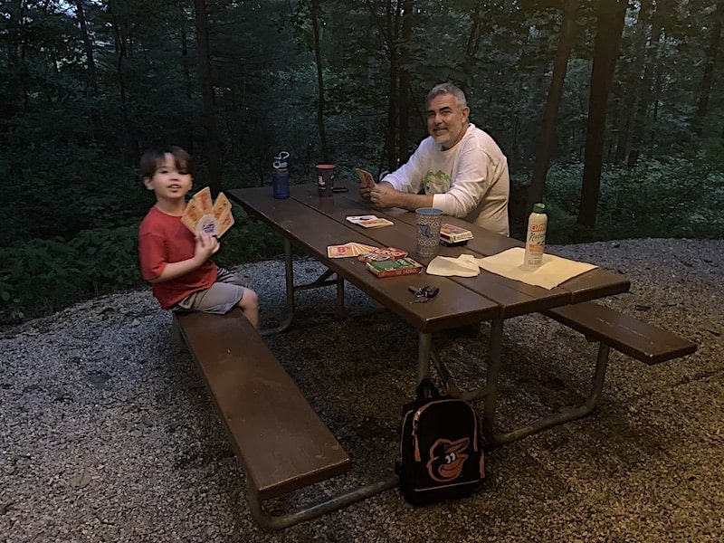Play cards at night when camping