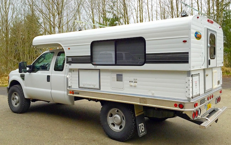 Alaskan flat bed truck camper