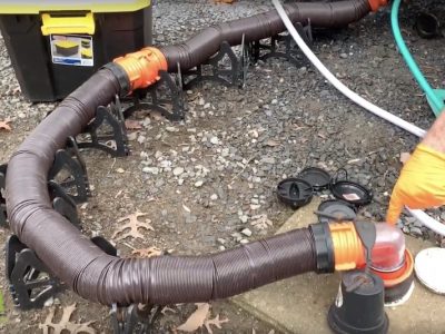 Sewer hose support for an RV