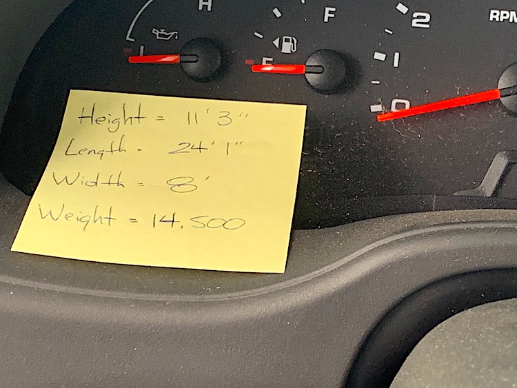 post it note on RV dashboard showing height weight length and width