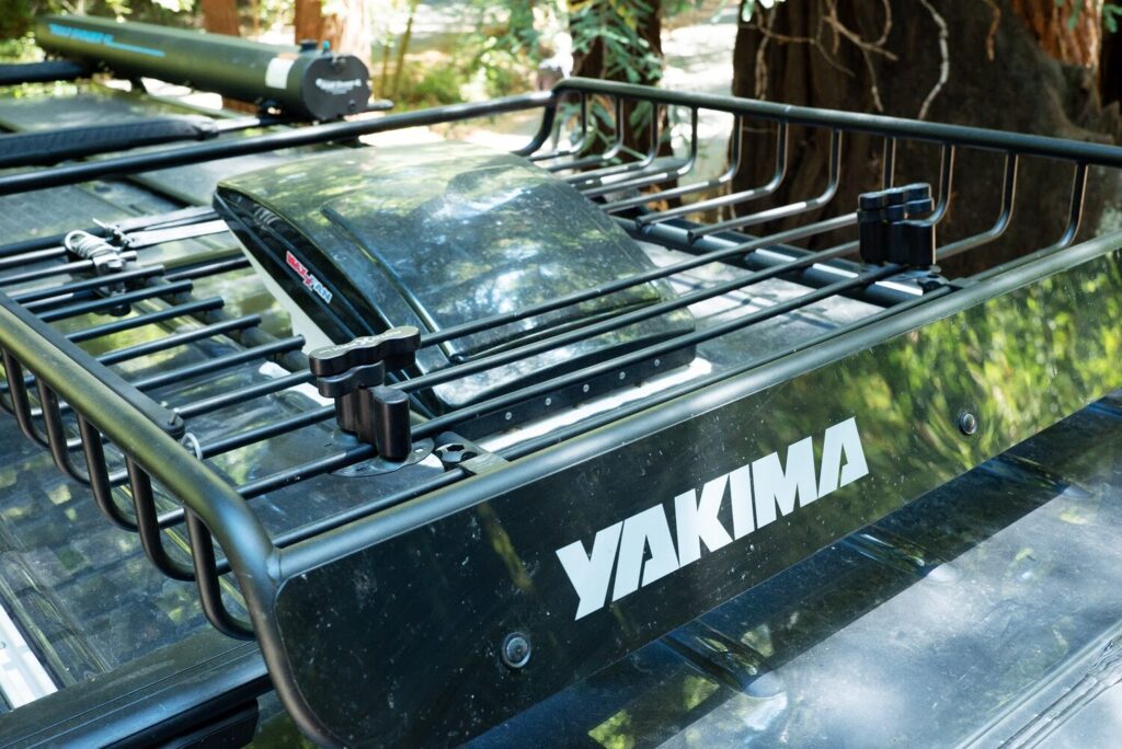 Black Yakima roof rack installed on a campervan