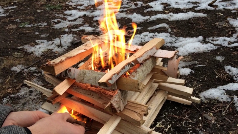 Campfire Building Tip Log Cabin