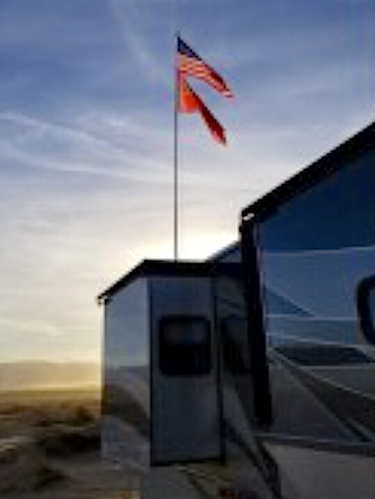 Flag pole on back of RV