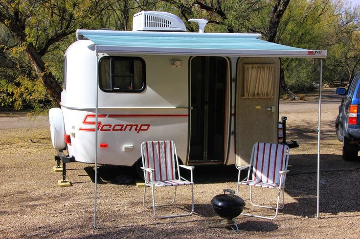 Scamp travel trailers have been around for decades This picture shows the exterior with an awning