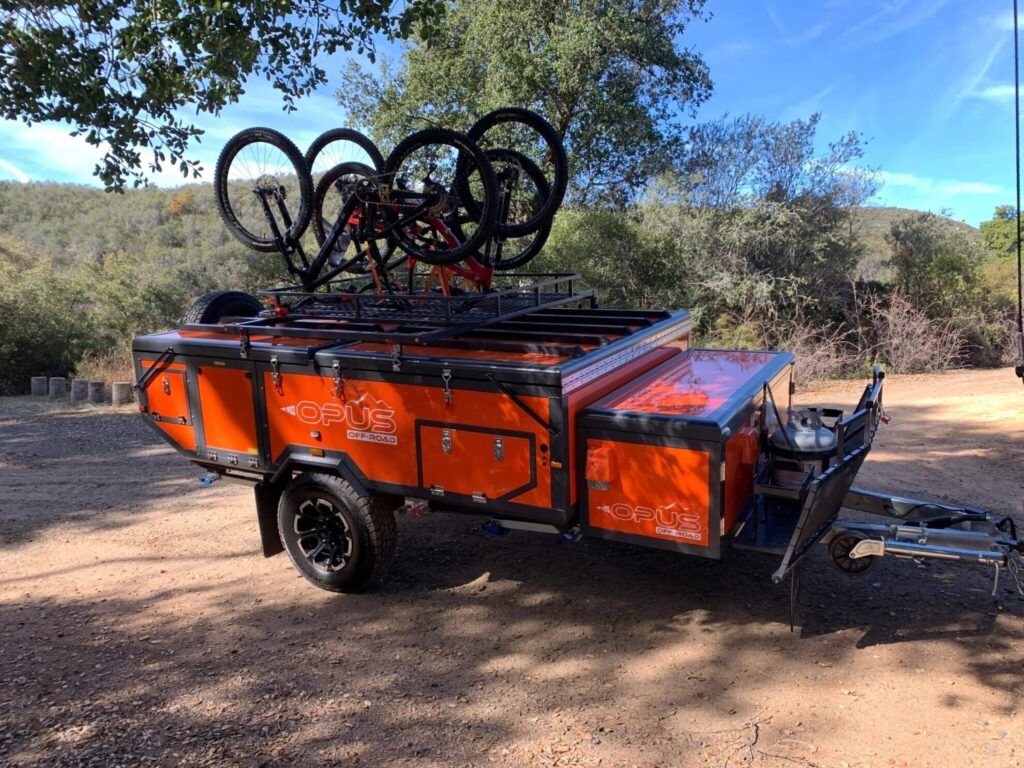 Pop-up camper with bikes loaded on top