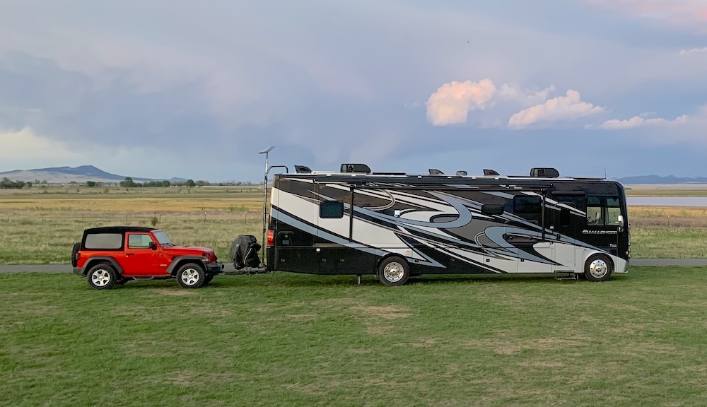 2021 Thor challenger towing our red 2 door jeep